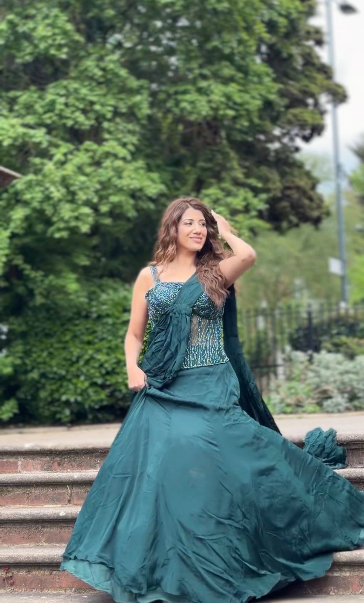 Dark Green drape corset fish cut lehenga